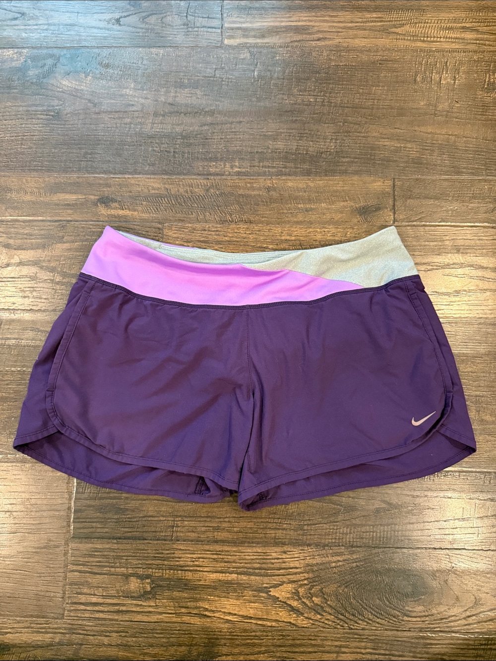 Nike Women's Purple Athletic Shorts with Purple Waistband and Light Gray Trim